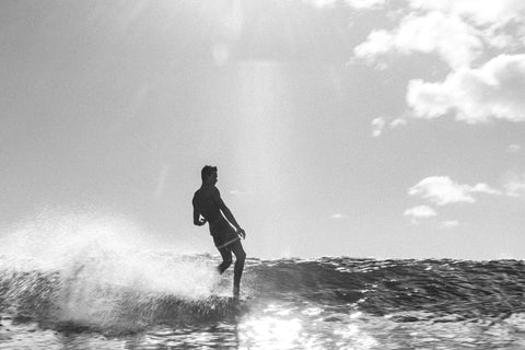 Kaimana Banes Surfing on a wave